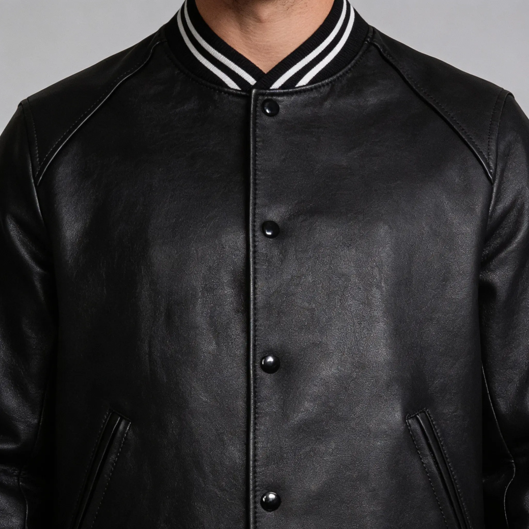 men-leather-varsity-jacket-closeup
